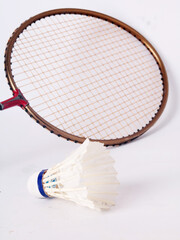 badminton racket and shuttlecock isolated on white