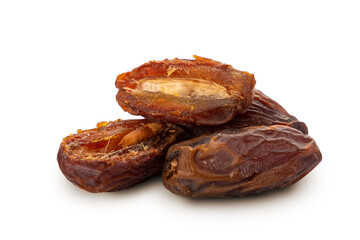 dried dates isolated on white background. The date is cut into two halves.