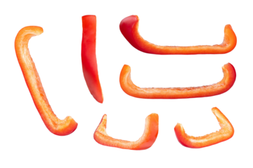 Set of fresh whole and sliced red bell pepper isolated on white background. With clipping path. Full depth of field. Focus stacking