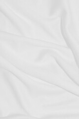 Fototapeta premium A clean white cloth with swaying streaks for the background.