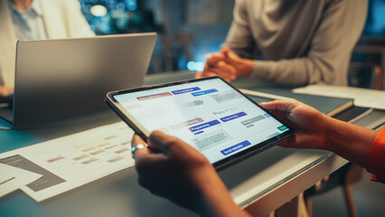 Positive Group of Managers Having a Team Meeting Long After Work Hours in the Night. Close Up on...