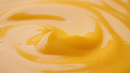 Yellow cheese sauce close up