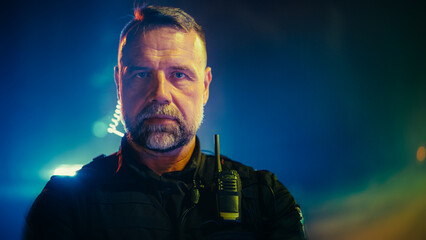 Professional Police Officer with Crossed Arms Looking at the Camera. Cop Maintains public order and...