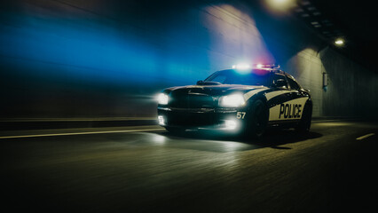 Fototapeta na wymiar Traffic Patrol Car In Pursuit, Driving Fast with Sirens Blazing through the City Streets. Officers of the Law Chasing a Suspect. Cops in Squad Car React to Emergency Call. Cinematic Night Shot