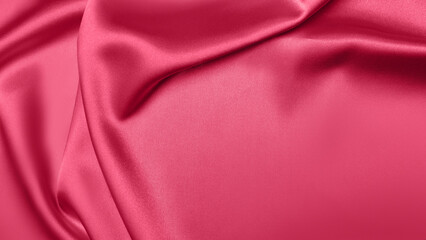 Viva Magenta toned red magenta fabric atlas. Close up pink silk satin texture for sewing. Abstract...