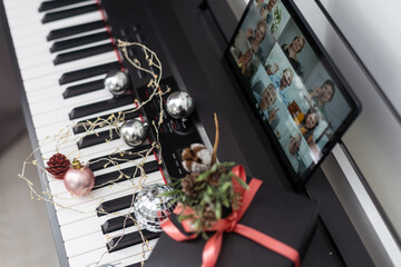 Christmas video call tablet. synthesizer, piano keys