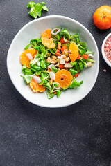 mandarin salad citrus green leaves bio product fresh healthy meal food snack on the table copy space food background rustic top view 