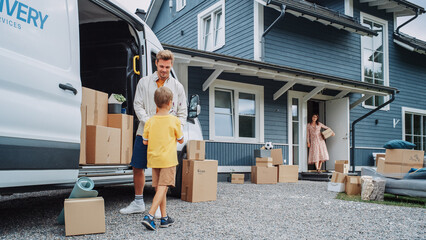 Handsome Man Unloading a Cargo Van Full of Cardboard Moving Boxes. Young Happy Family with a Son Moving to Their Dream Home in the Suburbs. Delivery Transportation Car Sharing Service.