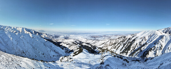 panoramic view of the mountain peaks. snowy mountain peaks