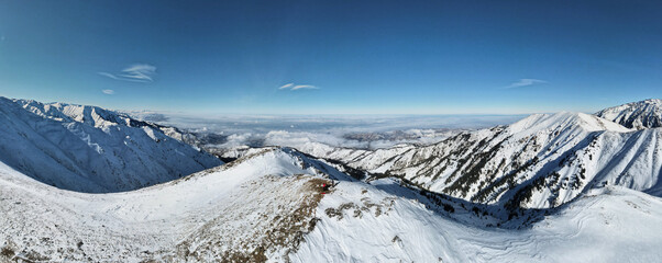 panoramic view of the mountain peaks. snowy mountain peaks