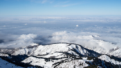 mountain peaks in the clouds. cloud mountains. misty peaks