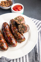 sausage meat green herb fresh ground pork, beef meal food snack on the table copy space food background rustic top view