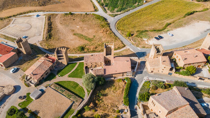 Beautiful view of the Church of Artajona called San Saturnino seen from drone, Navarra, Spain