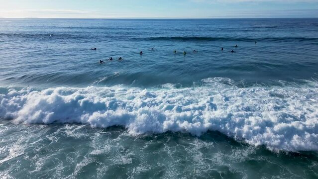 Surfers Over Huge Waves In The Paradise Beach Of Playa de Caion In Galicia, Spain. Aerial Drone Shot
