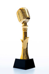 Golden microphone trophy on white background