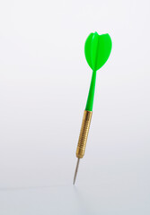 Single dart on white background