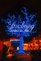 STRASBOURG, FRANCE - December 2015 - Blue tree Christmas decoration in place Gutenberg - obrazy, fototapety, plakaty