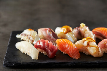 Different types of sushi on a plate	