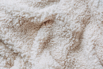 Soft cozy white fur background, close up
