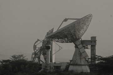 dish on the roof of the house