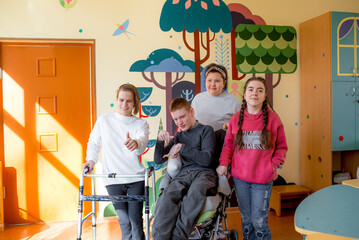 a group of teenagers with disabilities in a rehabilitation center.