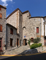 Fototapeta na wymiar Medieval castle with city hall in the old village of Sournia, Occitanie region in France