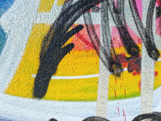 Colorful yellow, pink, blue and black urban wall texture. Modern pattern for wallpaper design...