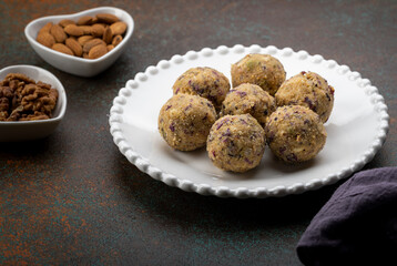 Dry fruit ladoo is a healthy ladoo prepared with only dry fruits without any sugar or jaggery, consumed in winter in India.
