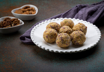 Dry fruit ladoo is a healthy ladoo prepared with only dry fruits without any sugar or jaggery, consumed in winter in India.