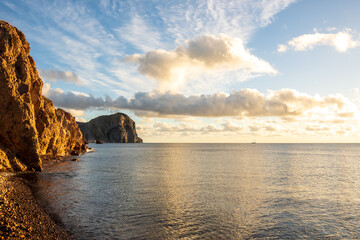 El Pulpito, seen from the south in morning with dramatic white clouds: Sea of Cortez: Baja de California Sur, Mexico	