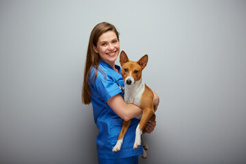 Veterinarian doctor with dog. Isolated portrait. - 555668375