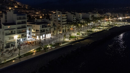 Fototapeta na wymiar New modern design park on the seafront of Altea (Alicante, Spain) illuminated at night