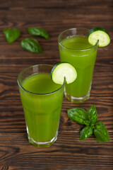 Cucumber lemonade with basil in a glass.