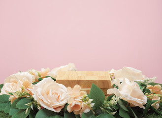 empty wooden podium beige rose bouquet flowers decoration on pink background with space.beauty cosmetic and romantic valentines or mother,birthday woman love gift product present scene stand display.