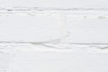 white old brick wall. brick texture with concrete. Horizontal image.