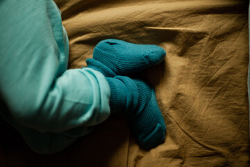 the child plays on the bed and near the bed