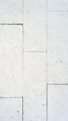 white old brick wall. brick texture with concrete. Vertical image.