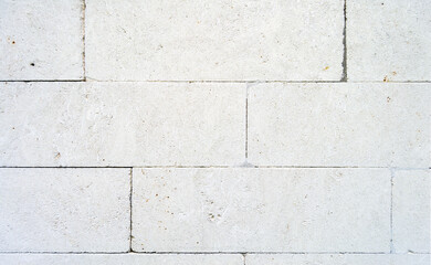 white old brick wall. brick texture with concrete. Horizontal image.