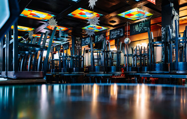 Chairs and tables stacked in a closed pub