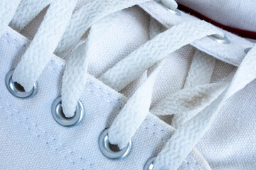 close up of white sneakers