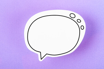 The Speech bubble with copy space communication talking speaking concepts on purple colour background.