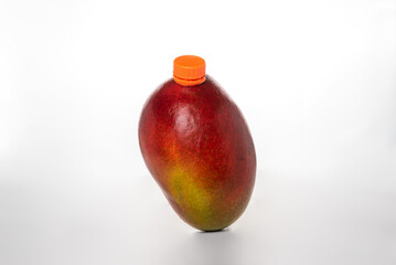 Mango,fruit, on white background,with spout to drink as a juice,close-up.