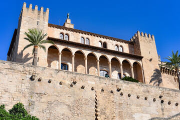 Fototapeta premium Palma de Mallorca, Spain - 7 Nov, 2022: Towers and outer walls of the Royal Palace of La Almudaina