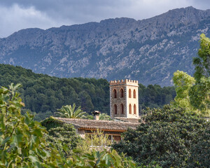 Soller, Mallorca, Spain - 11 Nov 2022: Historic buildings and palm trees on the holiday island of Mallorca