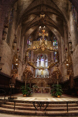 Fototapeta premium Palma de Mallorca, Spain - 10 Nov 2022: Gaudi designed Altar in the Palma Seo Cathedral Basilica