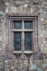 Fototapeta na wymiar Old decorated vintage window with beautiful design, in Romania