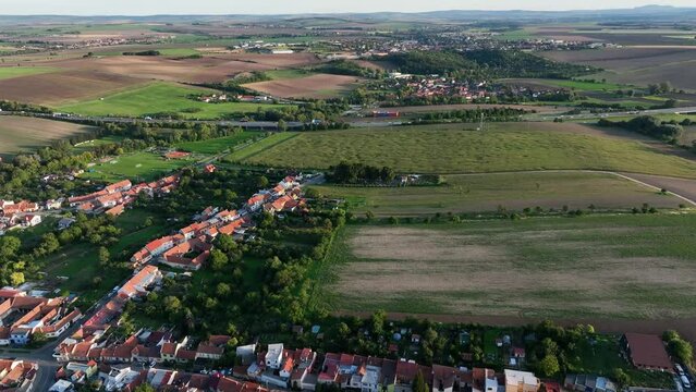 Golden Sunset in Small Village located in Czech republic, South Moravia, near Highway D1, with car passing by. 