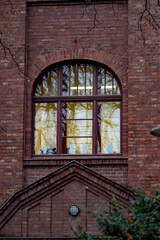 multi-piece window of an old brick industrial building
