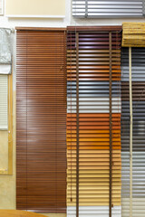 Samples of blinds for windows in the store.