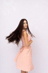 Young woman with long hair. Brunette